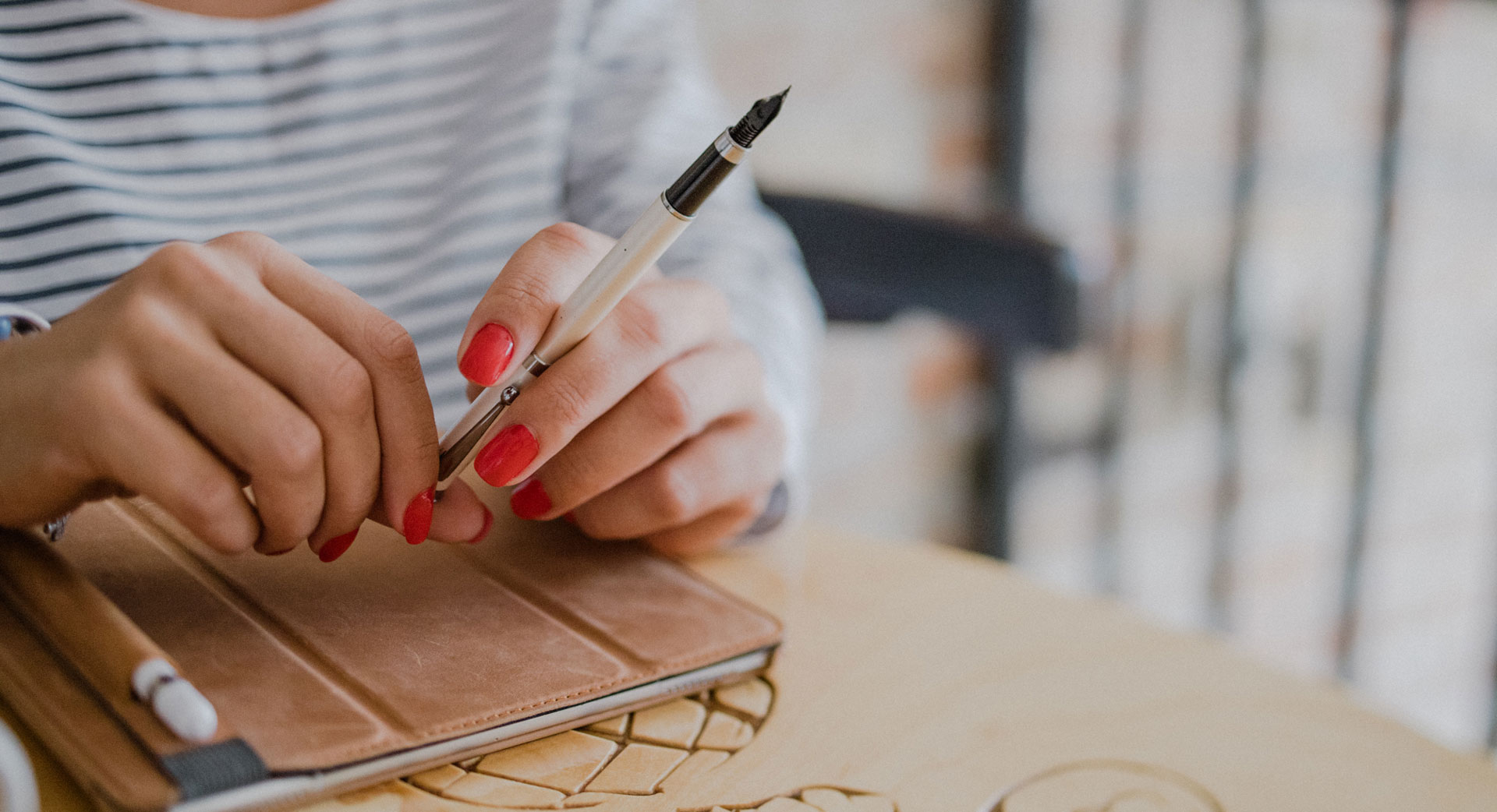 Notebook and fountain pen — writing a practice website